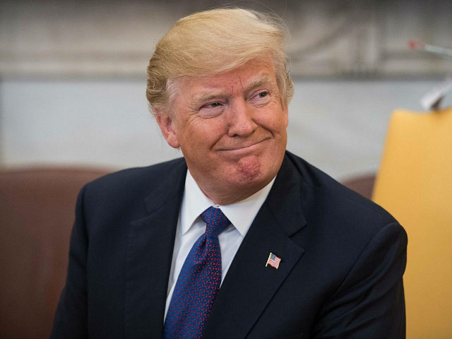 US President Donald Trump smiles during his meeting with his Kazakh counterpart Nursultan Nazarbayev in the Oval office at the White House in Washington, DC, on January 16, 2018. / AFP PHOTO / NICHOLAS KAMM (Photo credit should read NICHOLAS KAMM/AFP/Getty Images)