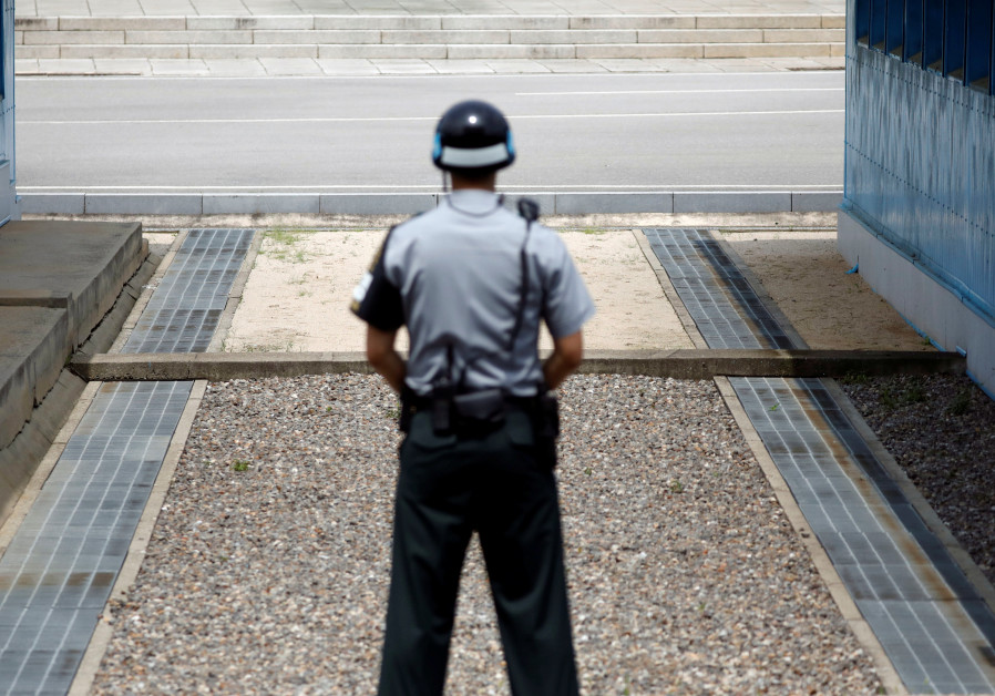 A concrete border is seen as a South Korean soldier stands guard at the truce village of Panmunjom, South Korea July 19, 2017. Photo By: REUTERS Israel says 'denuclearized' Korean peninsula helpful versus Iran