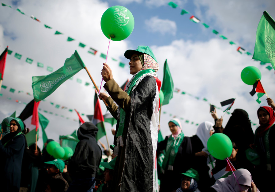 Palestinians supporting Hamas take part in a rally marking the 30th anniversary of Hamas' founding, in Gaza City December 14, 2017 Photo By: MOHAMMED SALEM/REUTERS Palestinians supporting Hamas at a rally marking the 30th anniversary of Hamas' founding, in Gaza