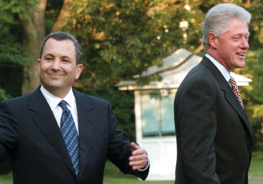 THEN-PRIME MINISTER Ehud Barak gestures as he and US president Bill Clinton depart the White House en route to Camp David in 1999 Photo By: MARK WILSON/REUTERS THEN-PRIME MINISTER Ehud Barak gestures as he and US president Bill Clinton depart the White House e