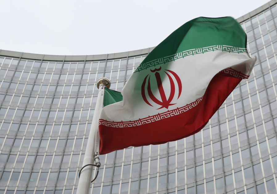 An Iranian flag flutters in front of the International Atomic Energy Agency (IAEA) headquarters in Vienna, Austria, January 15, 2016 Photo By: REUTERS Report: Europe, China, Russia discussing new deal for Iran