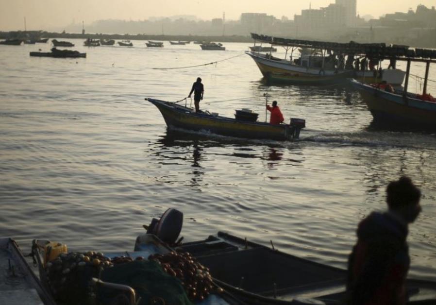 Palestinian fishermen in the waters off of the Gaza Strip Photo By: REUTERS Palestinian fishermen in the waters off of the Gaza Strip