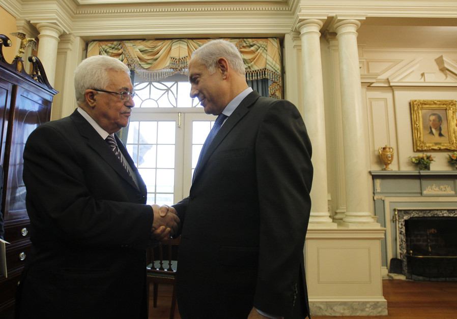 Israel's Prime Minister Benjamin Netanyahu (R) greets Palestinian President Mahmoud Abbas in the Monroe Room of the State Department in Washington September 2, 2010. Photo By: REUTERS/JASON REED Soccer diplomacy? Netanyahu, Abbas invited to World Cup final