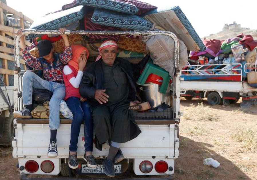 Syrian refugees prepare to return to Syria from the Lebanese border town of Arsal, Lebanon June 28, 2018 Photo By: MOHAMED AZAKIR / REUTERS Syrian refugees prepare to return to Syria from the Lebanese border town of Arsal, Lebanon