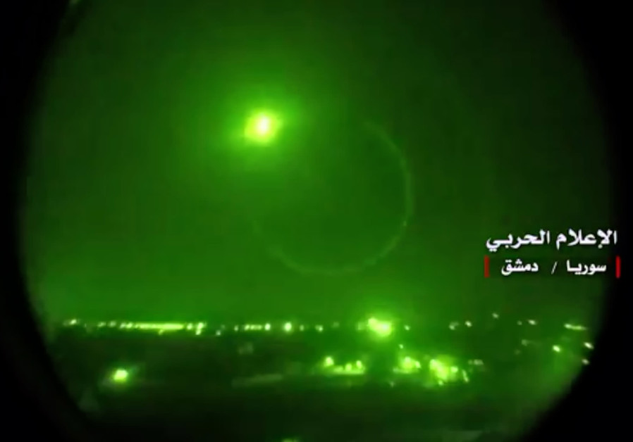 An image grab from a video released on May 10, 2018 by the "Central War Media" and broadcast on Syria's official TV purportedly shows Syrian air defense systems intercepting Israeli missiles over Syrian airspace Photo By: AFP PHOTO / HO / CENTRAL WAR MEDIA An image grab from a videopurportedly shows Syrian air defense systems intercepting Israeli missiles