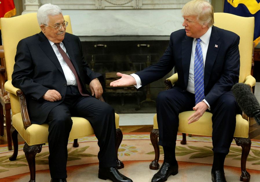 US President Donald Trump (R) welcomes Palestinian Authority President Mahmoud Abbas in the Oval Office at the White House in Washington on May 3, 2017 Photo By: REUTERS Trump Abbas