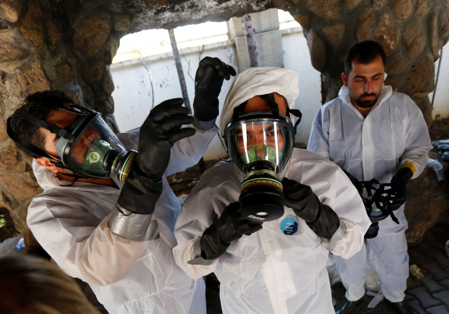 Syrian medical staff take part in a training exercise to learn how to treat victims of chemical weapons attacks, in a course organized by the World Health Organisation (WHO) in Gaziantep, Turkey Photo By: MURAD SEZER/REUTERS Syrian medical staff take part in training exercise to learn how to treat victims of chemical weapon