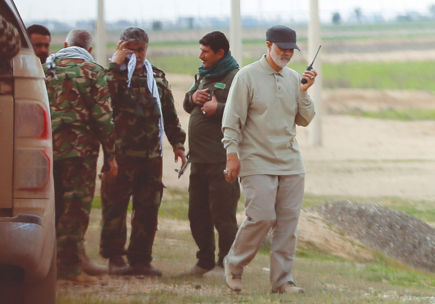 IRANIAN REVOLUTIONARY Guards Corps commander Qassem Soleimani uses a walkie-talkie at the frontlines during offensive operations against Islamic State, in Salahuddin province in 2015 Photo By: REUTERS IRANIAN REVOLUTIONARY Guards Corps commander Qassem Soleimani uses a walkie-talkie