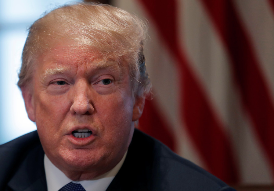 US President Donald Trump receives a briefing from senior military leadership at the Cabinet Room of the White House in Washington, DC April 9, 2018. Photo By: CARLOS BARRIA / REUTERS US President Donald Trump receives a briefing from senior military leadership at the Cabinet Room of