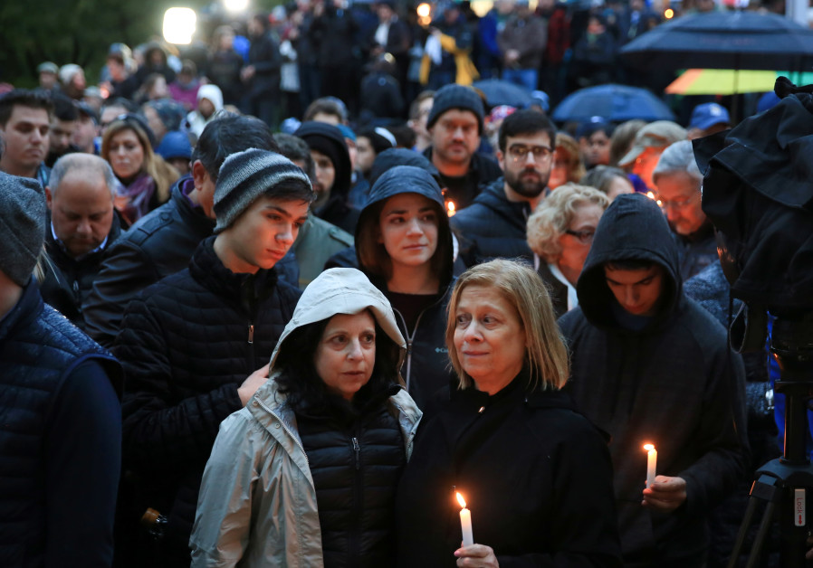People mourn the loss of life as they hold a vigil for the victims of Pittsburgh synagogue shooting in Pittsburgh, Pennsylvania, October 27, 2018 Photo By: JOHN ALTDORFER/REUTERS People mourn the loss of life as they hold a vigil for the victims of Pittsburgh synagogue shooting