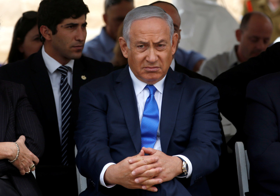 Israeli Prime Minister Benjamin Netanyahu attends an annual state memorial ceremony for Israel's first prime minister, David Ben Gurion, at his gravesite in Sde Boker Israel, November 14, 2018 Photo By: RONEN ZVULUN/REUTERS ANALYSIS: Why Netanyahu doesn’t want an election now