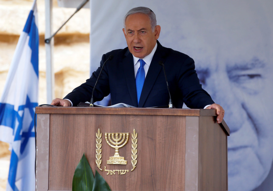 Israeli Prime Minister Benjamin Netanyahu speaks during an annual state memorial ceremony for Israel's first prime minister, David Ben Gurion, at his gravesite in Sde Boker Israel November 14, 2018 Photo By: RONEN ZVULUN/REUTERS Israeli Prime Minister Benjamin Netanyahu speaks during an annual state memorial ceremony for Israel