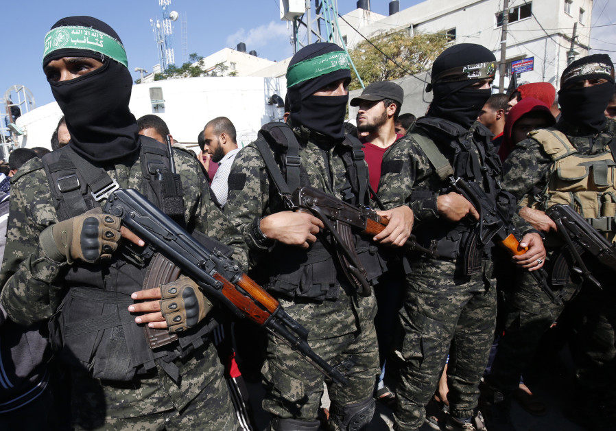 Palestinian militants of the Islamist movement Hamas' military wing Al-Qassam Brigades Photo By: SAID KHATIB / AFP Palestinian militants of the Islamist movement Hamas' military wing Al-Qassam Brigades