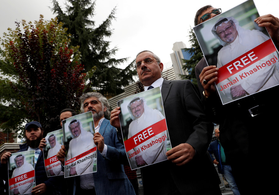 Human rights activists and friends of Saudi journalist Jamal Khashoggi hold his pictures during a protest outside the Saudi Consulate in Istanbul, Turkey October 8, 2018 Photo By: REUTERS/MURAD SEZER/FILE PHOTO Human rights activists and friends of Saudi journalist Jamal Khashoggi hold his pictures during a pr