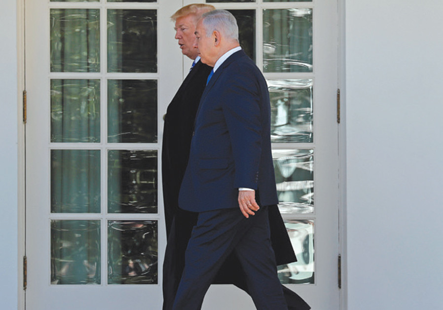 US President Donald Trump and Prime Minister Benjamin Netanyahu walk to the Oval Office on March 5, 2018 Photo By: KEVIN LAMARQUE/REUTERS Leaders under siege: Trump and Netanyahu battle for their political lives