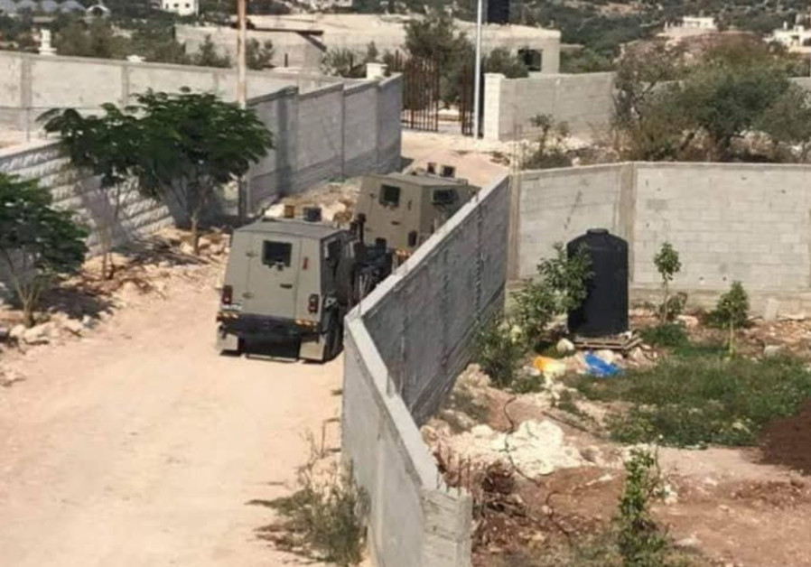 IDF Forces surround house of Ashraf Walid Suleiman Na’alwa Photo By: PALESTINIAN MEDIA Report: IDF surrounds family home of Barkan terrorist