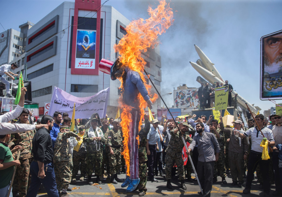 A scarecrow model is set on fire by Iranian demonstratorson during the annual pro-Palestinian rally marking Al-Quds Day in Tehran, Iran, June 23, 2017. Photo By: NAZANIN TABATABAEE YAZDI/ TIMA VIA REUTERS A scarecrow model is set on fire by Iranian demonstratorson during the annual pro-Palestinian rally