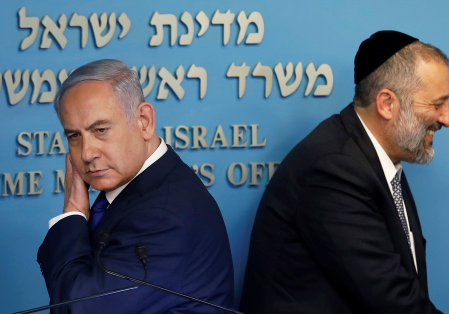Israeli Prime Minister Benjamin Netanyahu and Israeli Interior Minister Aryeh Deri are seen at the end of a news conference at the Prime Minister's office in Jerusalem, April 2, 2018. Photo By: RONEN ZVULUN/REUTERS What does Aryeh Deri’s possible indictment mean for the coalition?