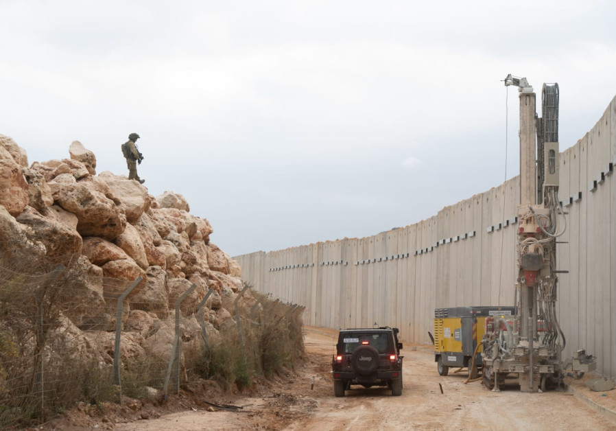 IDF soldier stands watch over engineering device looking for Hezbollah tunnels Photo By: IDF SPOKESPERSON'S UNIT IDF soldier stands watch over engineering device looking for Hezbollah tunnels
