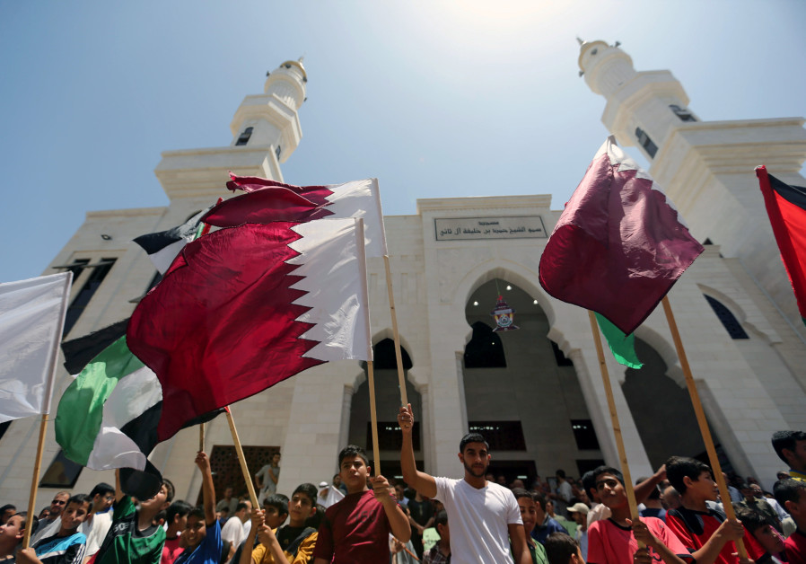 Palestinians take part in a rally in support of Qatar, inside Qatari-funded construction project 'Hamad City', in the southern Gaza Strip, June 9, 2017 Photo By: REUTERS/IBRAHEEM ABU MUSTAFA Gaza Qatar