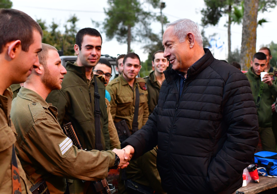 Prime Minister Benjamin Netanyahu meets IDF soldiers, December 11, 2018 Photo By: KOBI GIDEON/GPO Politicians praise IDF, warn 'Israel's strong arm will reach anyone'