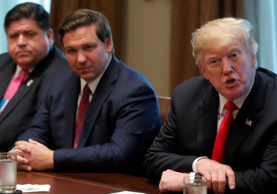 U.S. President Donald Trump meets with new U.S. governor-elect Ron DeSantis of Florida Photo By: REUTERS/JIM YOUNG U.S. President Donald Trump meets with new U.S. governor-elect Ron DeSantis of Florida