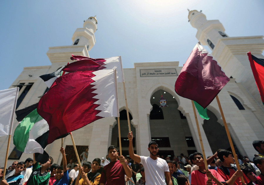 PALESTINIANS TAKE part in a rally in support of Qatar, inside Qatari-funded construction project ‘Hamad City’, in the southern Gaza Strip, in June Photo By: REUTERS U.N., Qatar send diplomats to Gaza in bid to resolve crisis over funds