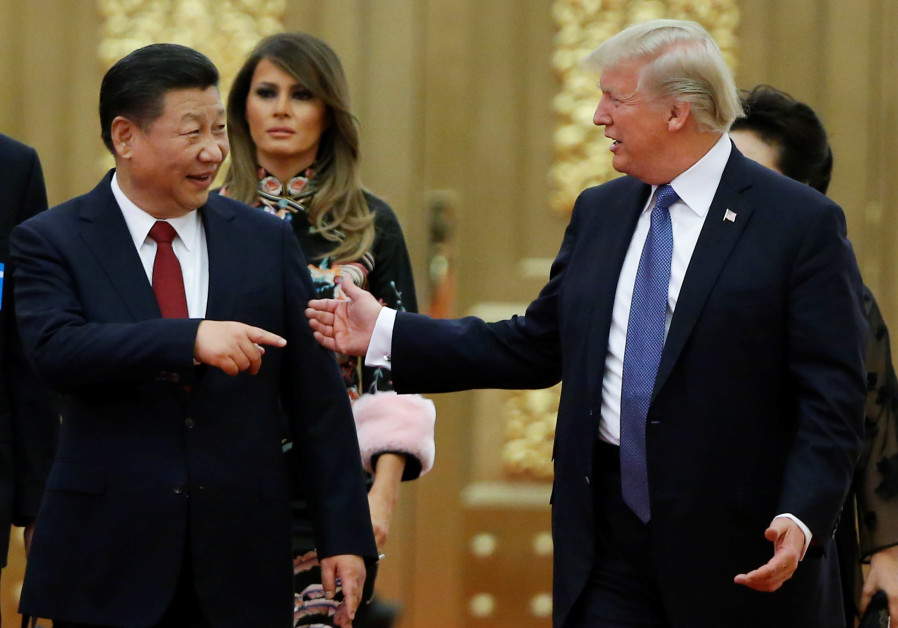 US President Donald Trump and China's President Xi Jinping arrive at state dinner, Great Hall of the People, Beijing, 2017. Photo By: THOMAS PETER/REUTERS US President Donald Trump and China's President Xi Jinping arrive at state dinner, Great Hall, 2017