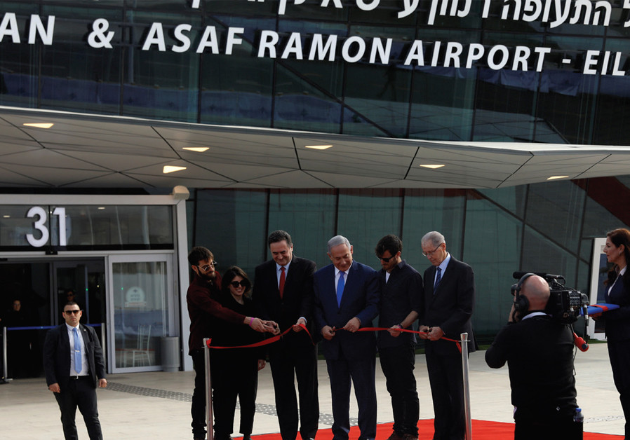 The three Ramon children, Tal, Noa and Yiftach, join Prime Minister Benjamin Netanyahu and Transportation Minister Israel Katz and Israel Airports Authority CEO Yaakov Ganot in cutting a red ribbon at the inauguration of the Ramon Airport on January 21, 2019 Photo By: RONEN ZVULUN Ilan Ramon’s life and death: The legacy of a luminary