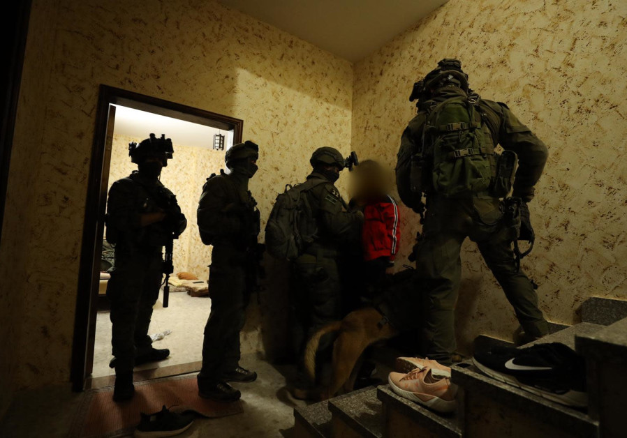 Police arrest Palestinian man Arafat al-Rifaiyeh, 29, suspected of murdering Ori Ansbacher, 19, in this photo released on February 10th, 2019 Photo By: ISRAEL POLICE Police arrest Arafat al-Rifaiyeh, 29, suspected of murdering Ori Ansbacher, 19