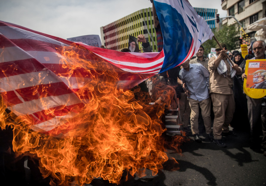 Iranians burn a U.S. flag during a protest against President Donald Trump's decision to walk out of a 2015 nuclear deal, in Tehran, Iran, May 11, 2018. Photo By: REUTERS Pompeo wants to confront Iran, but how?