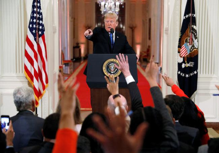 U.S. President Donald Trump points to a questioner while taking questions during a news conference following Tuesday's midterm congressional elections at the White House in Washington, U.S., November 7, 2018 Photo By: KEVIN LAMARQUE/REUTERS U.S. President Donald Trump points to a questioner while taking questions during a news conference