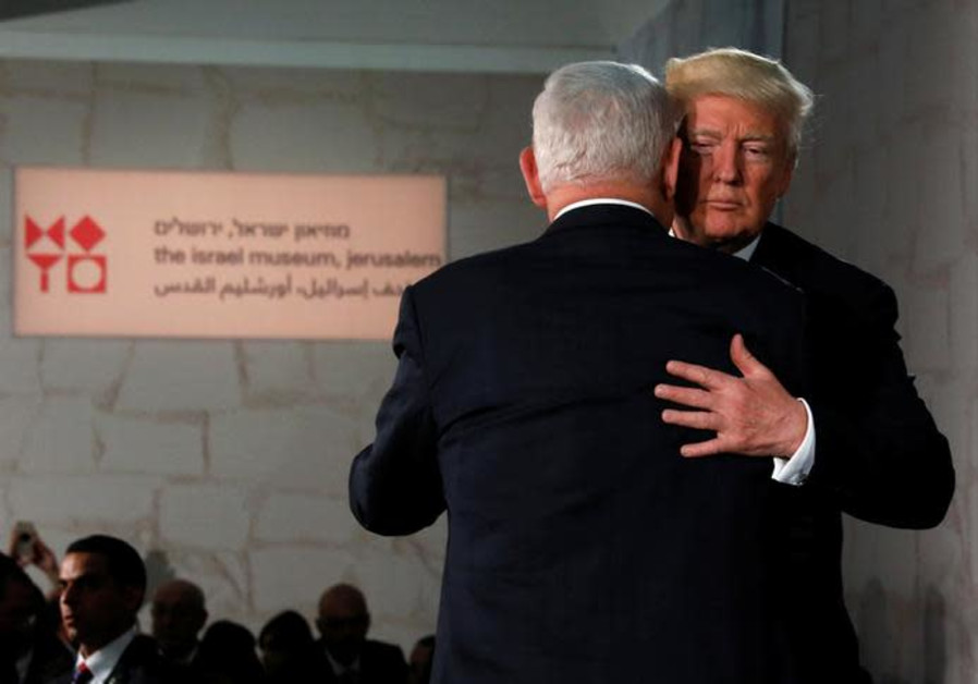 U.S. President Donald Trump (R) embraces Israel's Prime Minister Benjamin Netanyahu after his remarks at the Israel Museum in Jerusalem May 23, 2017 Photo By: JONATHAN ERNST / REUTERS U.S. President Donald Trump (R) embraces Israel's Prime Minister Benjamin Netanyahu