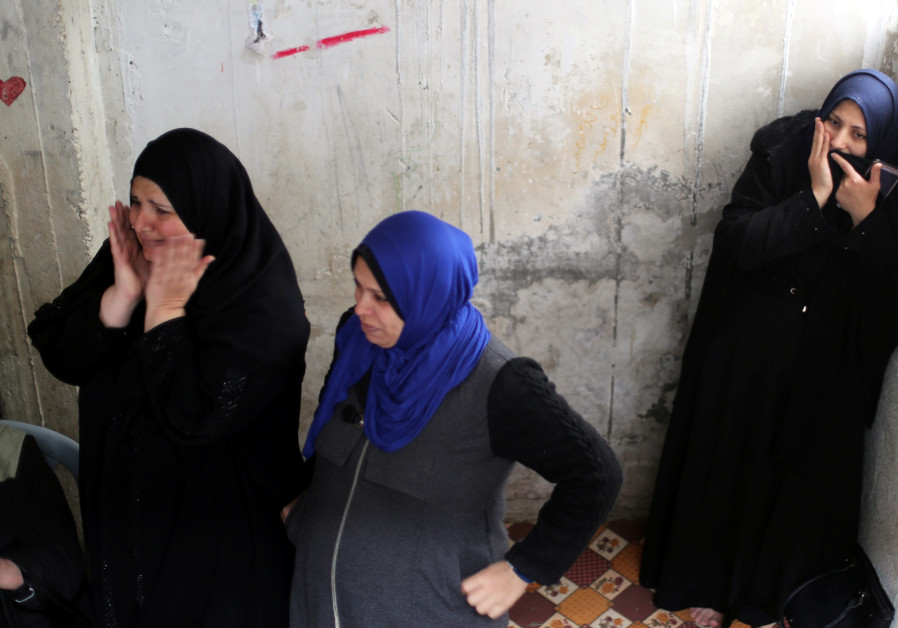 Relatives of Palestinian Mohamad Sa'ad, who was killed at the Israel-Gaza border, react during his funeral in Gaza City March 30, 2019. Photo By: MOHAMMED SALEM/ REUTERS Four dead, hundreds wounded in Gaza border protests