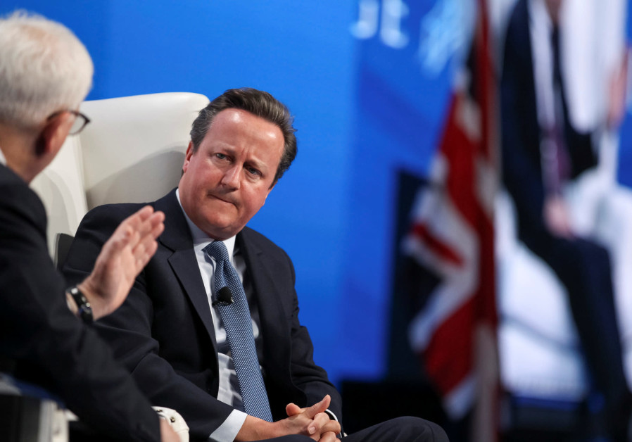 David M. Rubenstein (L), co-founder and co-chief executive officer at The Carlyle Group, holds a discussion with former British Prime Minister David Cameron during the SALT conference in Las Vegas, Nevada, U.S. May 17, 2017 Photo By: REUTERS How David Cameron’s London Holocaust memorial turned to a battle of wills