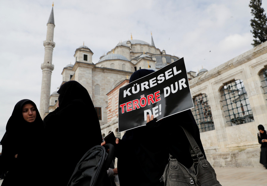 Women take part in a demonstration to protest against the Christchurch mosque attack in New Zealand, Istanbul, Turkey, 2019. Photo By: REUTERS/MURAD SEZER Istanbul women demonstrate to protest the Christchurch mosque attack in NZ, 2019.