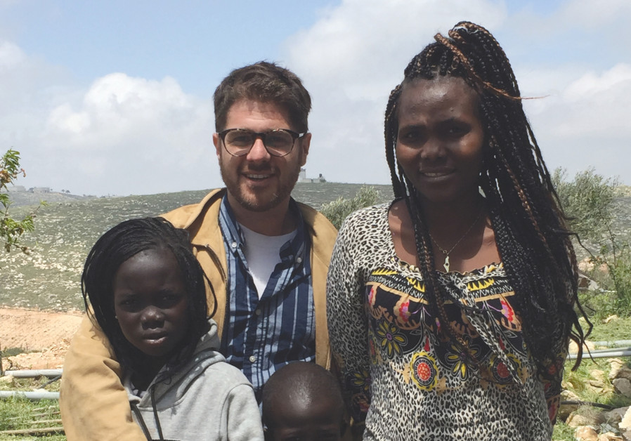 A.Y. KATSOF with Piath Aguar and her two children, Ayen and Bior, celebrating their new life in Israel at Katsof’s home in Eish Kodesh Photo By: Courtesy A.Y. KATSOF with Piath Aguar and her two children, Ayen and Bior, celebrating their new life