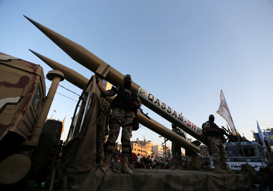 Palestinian members of al-Qassam Brigades, the armed wing of the Hamas movement, display home-made rockets during an anti-Israel military parade, in Rafah in the southern Gaza Strip August 21, 2016 Photo By: IBRAHEEM ABU MUSTAFA/REUTERS Crypto terror financing: Hamas shifts tactics in bitcoin fundraising