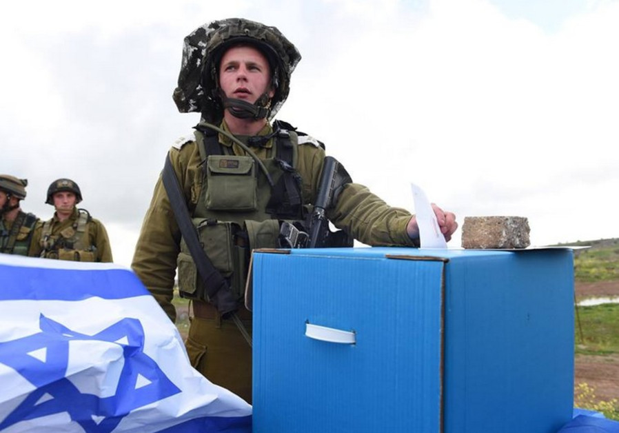Israeli soldier casts his vote Photo By: IDF Israeli soldier