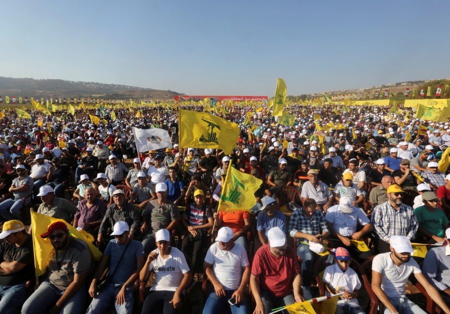 Supporters of Lebanon's Hezbollah leader Sayyed Hassan Nasrallah display Hezbollah flags during a rally marking the 11th anniversary of the end of Hezbollah's 2006 war with Israel, in the southern village of Khiam, Lebanon August 13, 2017. Photo By: AZIZ TAHER/REUTERS Nasrallah: Israeli home-front not prepared for war