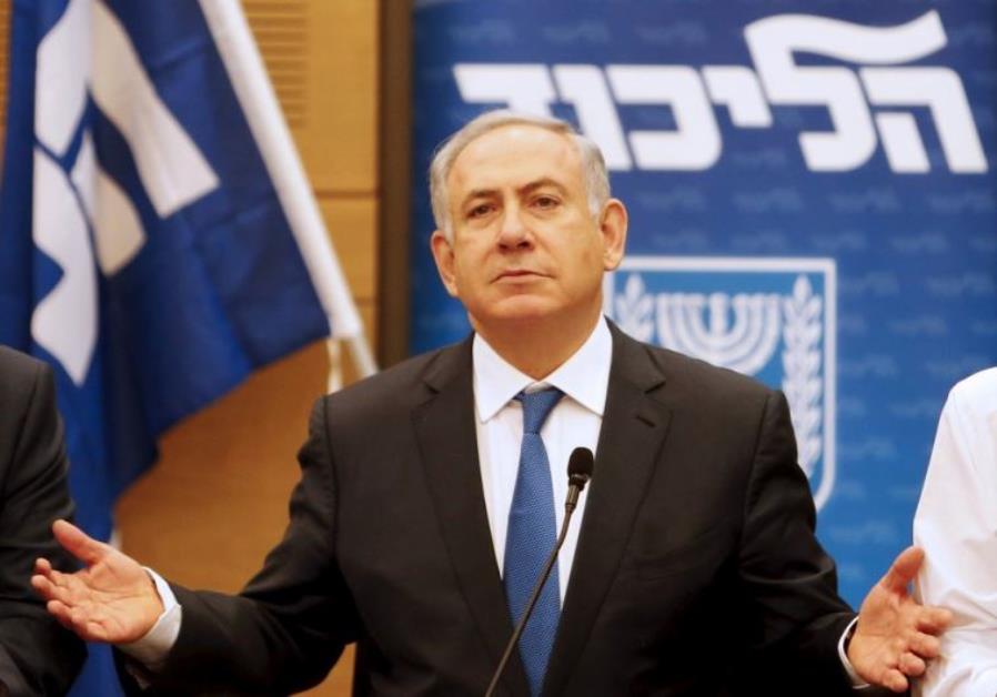 Prime Minister Benjamin Netanyahu (C) attends a meeting of the Likud party in the Israeli parliament in Jerusalem Photo By: REUTERS Prime Minister Benjamin Netanyahu (C) attends a meeting of the Likud party