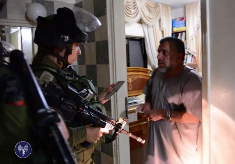 IDF soldiers arrest senior Hamas official Hassan Yousef Photo By: screenshot IDF Hamas arrest