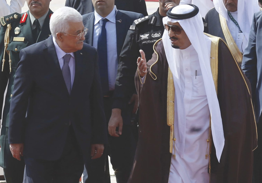 Saudi Arabia's King Salman bin Abdulaziz Al Saud walks with Palestinian President Mahmoud Abbas during a reception ceremony in Riyadh in 2015. Photo By: REUTERS/FAISAL AL NASSER Saudi Arabia's King Salman bin Abdulaziz Al Saud walks with Palestinian President Mahmoud Abbas