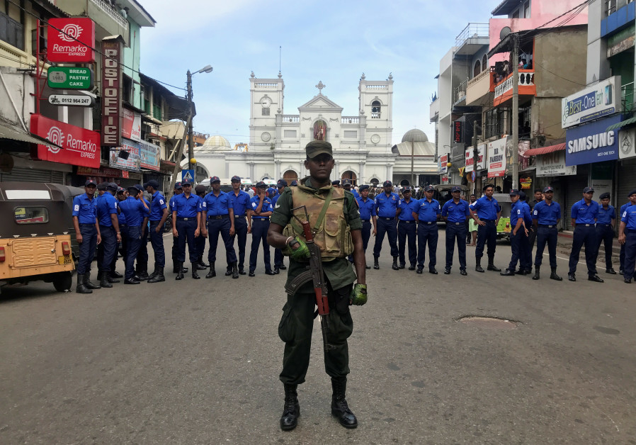 Sri Lankan military officials stand guard in front of the St. Anthony's Shrine, Kochchikade church after an explosion in Colombo, Sri Lanka Photo By: DINUKA LIYANAWATTE/REUTERS Sri Lanka: Seven arrested, curfew implemented as 207 killed in blasts