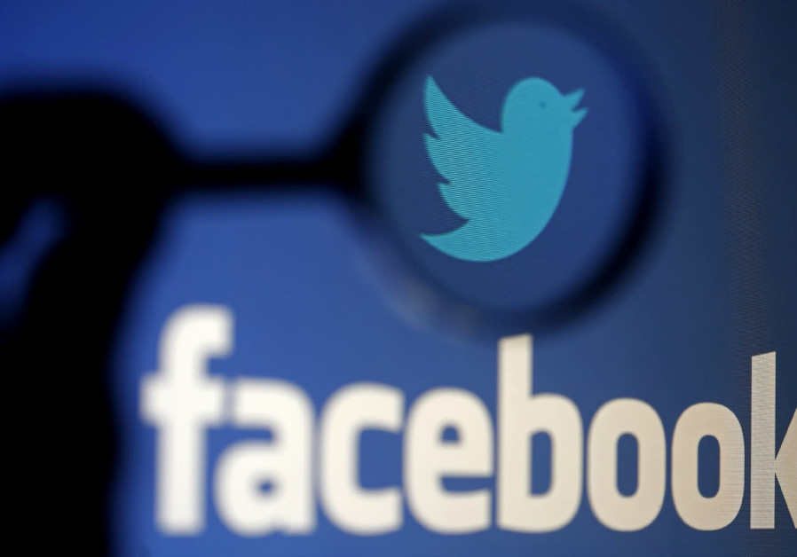 A LOGO of Twitter is pictured next to the logo of Facebook. Photo By: REUTERS/DADO RUVIC/ILLUSTRATION/FILE PHOTO A LOGO of Twitter is pictured next to the logo of Facebook.