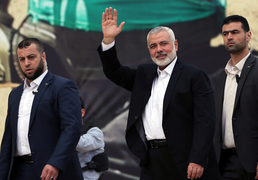 Hamas Chief Ismail Haniyeh gestures during a rally marking the 31st anniversary of Hamas' founding, in Gaza City December 16, 2018 Photo By: IBRAHEEM ABU MUSTAFA / REUTERS Hamas Chief Ismail Haniyeh gestures during a rally marking the 31st anniversary of Hamas' founding,