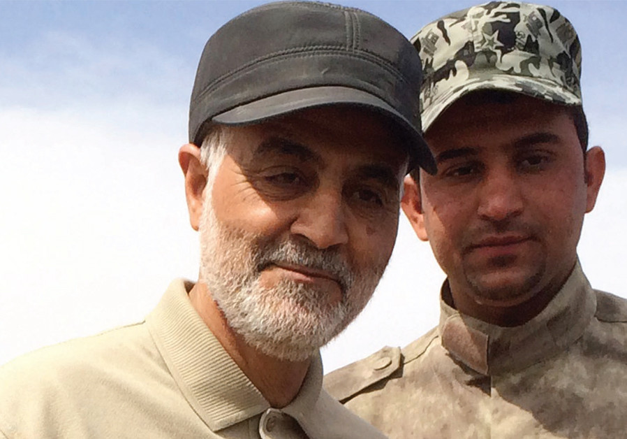 Iranian Revolutionary Guard Commander Qassem Soleimani (left) stands on the frontlines during an offensive operation against Islamic State in the town of Tal Ksaiba, in Iraq, in 2015 Photo By: STRINGER/ REUTERS Iran readies for proxy war in Middle East - report