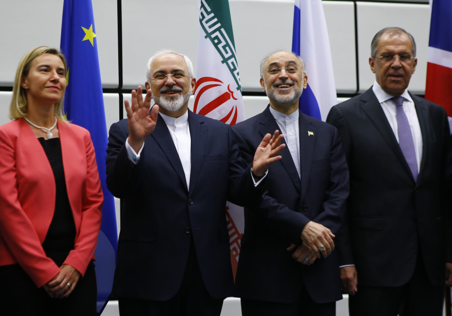 Iran FM Zarif, EU Rep. for Foreign Affairs Mogherini, and Iranian and Russian officials at signing of nuclear deal in Vienna, 2015 Photo By: LEONHARD FOEGER / REUTERS Iran FM Zarif, EU Foreign Affairs Rep. Mogherini, and Iranian and Russian officials in Vienna 2015