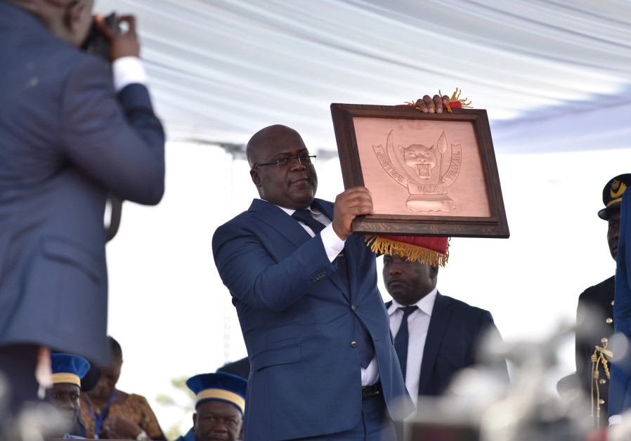 Felix Tshisekedi holds the country's coat of arms during the inauguration ceremony whereby Tshisekedi was sworn into office as the new president of the Democratic Republic of Congo at the Palais de la Nation in Kinshasa, Democratic Republic of Congo, January 24, 2019 Photo By: OLIVIA ACLAND/REUTERS Felix Tshisekedi during the inauguration ceremony on January 24, 2019