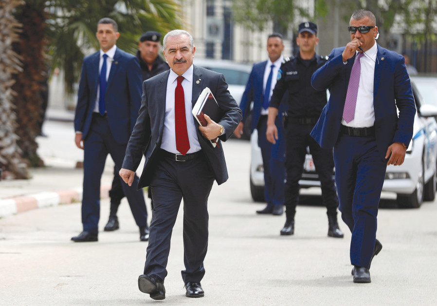 HEADED TOWARD conflict? Palestinian Prime Minister Mohammad Shtayyeh arrives for a cabinet meeting of the new Palestinian government, in Ramallah, earlier this week Photo By: REUTERS/MOHAMAD TOROKMAN HEADED TOWARD conflict? Palestinian Prime Minister Mohammad Shtayyeh arrives for a cabinet meeting